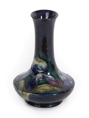 Lot 1047 - Walter Moorcroft (1917-2002): An Orchid and Spring Flowers Pattern Vase, impressed factory...