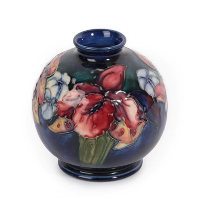 Lot 1048 - Walter Moorcroft (1917-2002): An Orchid and Spring Flowers Pattern Vase, impressed factory...