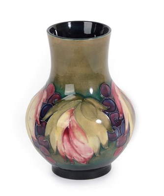 Lot 1049 - Walter Moorcroft (1917-2002): A Leaf and Grape Pattern Vase, impressed factory marks POTTER TO...