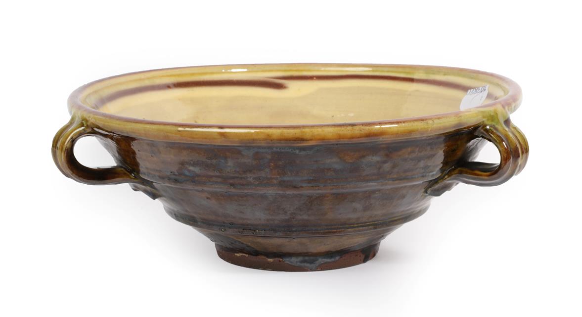 Lot 1053 - Clive Bowen (b.1943): A Red Earthenware Bowl, with three loop handles, wood-fired with green...