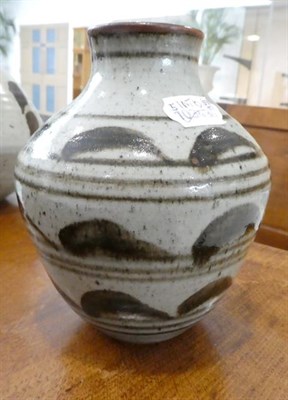 Lot 1055 - Constance E Dunn (nee Wade): A Stoneware Vase, oatmeal glaze with tenmoku brush strokes and...