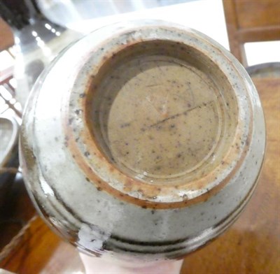 Lot 1055 - Constance E Dunn (nee Wade): A Stoneware Vase, oatmeal glaze with tenmoku brush strokes and...