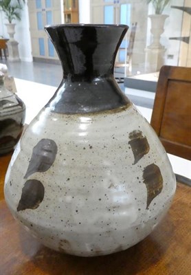 Lot 1061 - Janet Darnell Leach (American, 1918-1997): A Stoneware Vase, oatmeal glaze with tenmok brush...