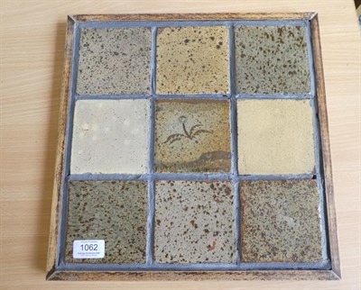Lot 1062 - Leach Pottery: Nine Stoneware Tiles, the central tile decorated with a flower, one tile with...