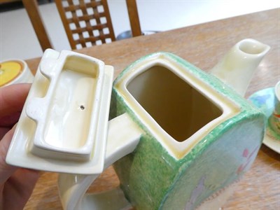 Lot 1076 - A Clarice Cliff Wilkinson Chalet Bon Jour Coffee Pot and Cover, printed marks, 19cm; and A...