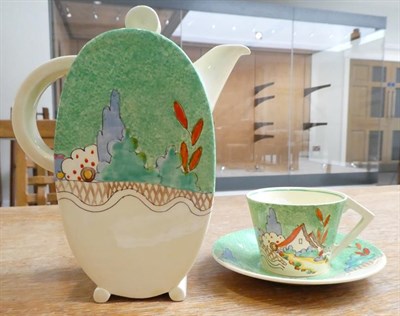 Lot 1076 - A Clarice Cliff Wilkinson Chalet Bon Jour Coffee Pot and Cover, printed marks, 19cm; and A...