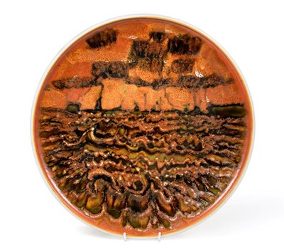 Lot 1082 - Tony Morris for Poole Pottery: A Studio Charger, circa 1962-4, painted with a seascape in...