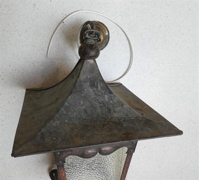 Lot 1093 - An Arts & Crafts Copper Lacquer Hall Lantern, the pagoda roof above a beaten effect frame with...