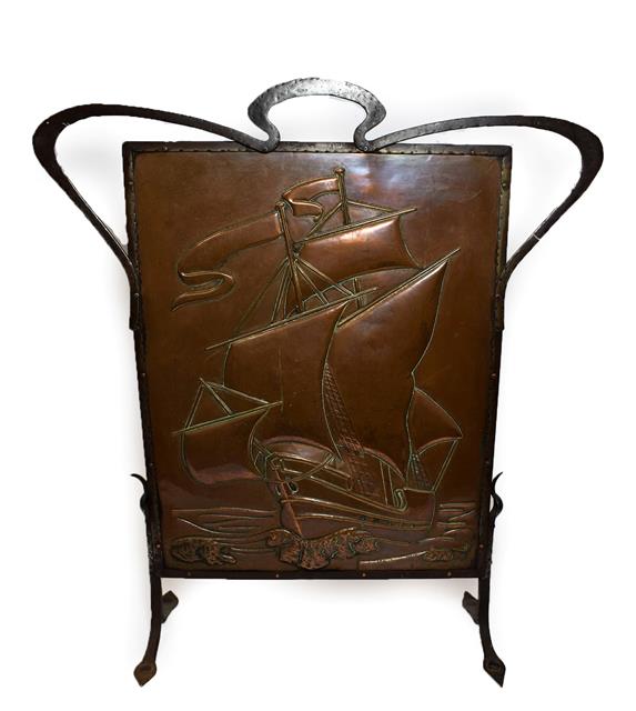 Lot 1095 - An Arts & Crafts Copper and Wrought Iron Fire Screen, embossed with a galleon in full sail,...