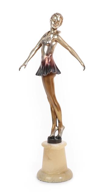 Lot 1102 - An Art Deco Spelter Figure, circa 1925, of a dancer, wearing a silvered and tinted pink one...