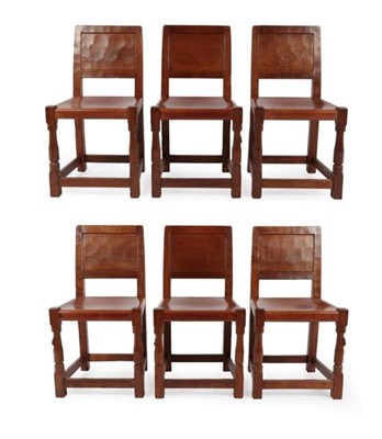 Lot 1110 - Robert Mouseman Thompson (1876-1955): A Set of Six English Oak Panel Back Dining Chairs, 1949,...