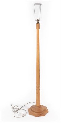 Lot 1114 - Workshop of Robert Mouseman Thompson (Kilburn): An English Oak Standard Lamp, post 1960's,...