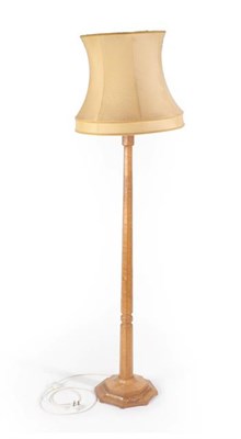 Lot 1121 - Workshop of Robert Mouseman Thompson (Kilburn): An English Oak Standard Lamp, post 1955,...