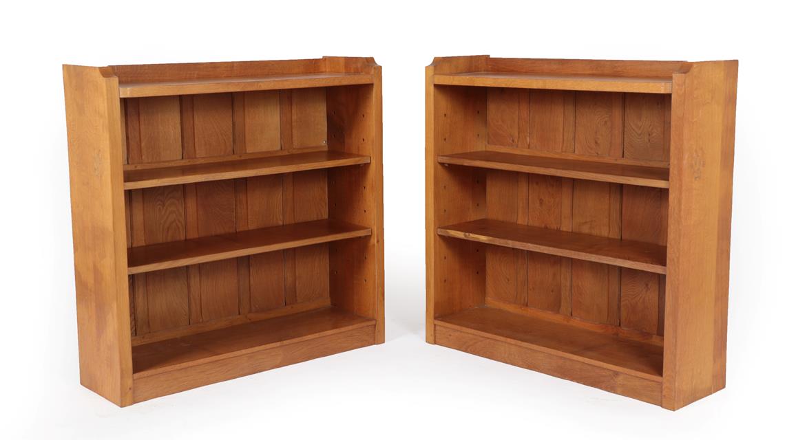 Lot 1151 - Cat and Mouseman: A Pair of Lyndon Hammell (Harmby) English Oak Open Bookcases, raised...