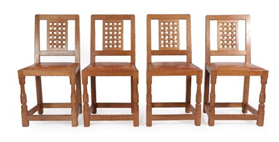 Lot 1166 - A Set of Four Sid Pollard (Thirsk) English Oak Lattice Back Dining Chairs, with nailed tan hide...
