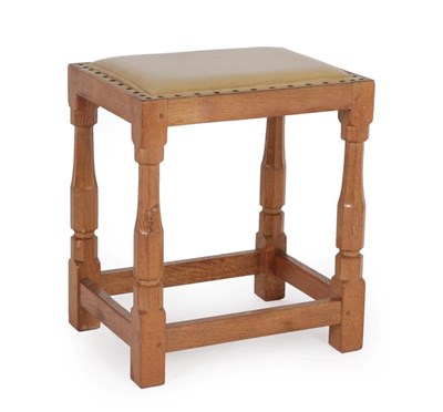 Lot 1172 - Squirrelman: A Wilfrid Hutchinson (Husthwaite) English Oak Dressing Table Stool, on four...