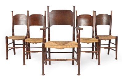 Lot 1179 - William Birch, High Wycombe: A Set of Five (4+1) Oak Dining Chairs, circa 1900, each with broad...