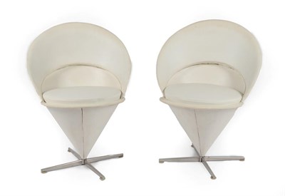 Lot 1196 - A Pair of 1960's Verner Panton Cone Chairs, white vinyl removable seats, stainless steel base, both