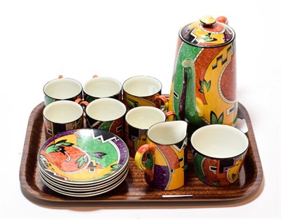 Lot 18 - An Art Deco Clarice Cliff style coffee set, abstract pattern, stamped 'Made in England',...