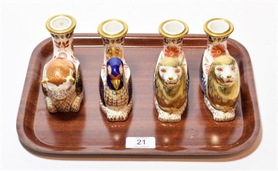Lot 21 - A pair of Royal Crown Derby candlesticks modelled as lions; together with two others (4)