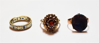 Lot 59 - A 9 carat gold garnet cluster ring, finger size P; and two further 9 carat gold rings