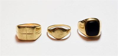 Lot 62 - A 9 carat gold signet ring, misshapen; and two further signet rings, unmarked