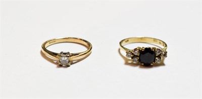 Lot 66 - A 9 carat gold princess cut diamond solitaire ring, finger size M; and a gemset ring, stamped...