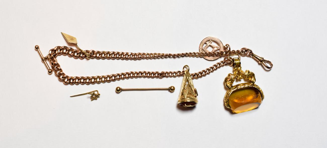 Lot 67 - A Masonic chain with swivel fob, length 28.5cm; a 9 carat gold Masonic stick pin; and another 9...