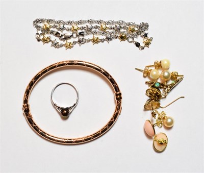 Lot 74 - A 9 carat rose gold bangle; a 9 carat gold cultured pearl ring, finger size M; a bracelet...