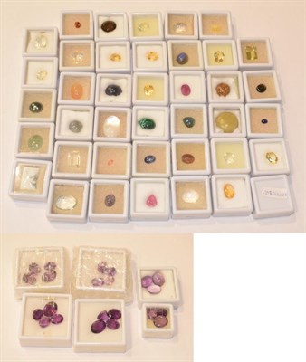 Lot 77 - A quantity of loose gemstones including amethysts, smoky quartz, rock crystal, haematite,...