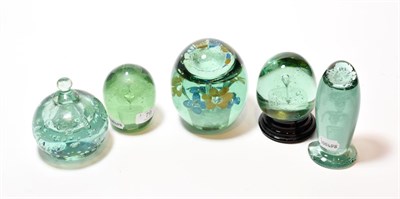 Lot 79 - Five Victorian green glass dumps and inkwell dump paperweight, the largest with flower...