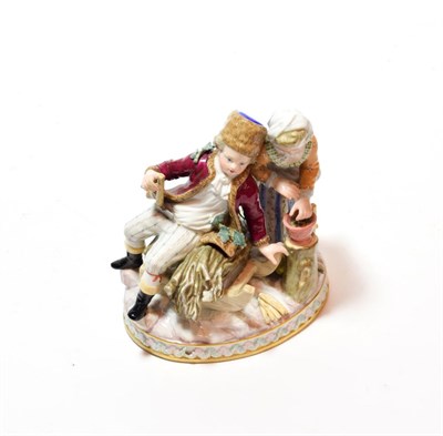 Lot 114 - An early 20th century Meissen figural group of two children cutting wood