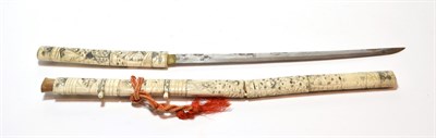 Lot 117 - An early 20th century Japanese bone Wakizashi, with 40cm single edge steel blade, the sectional...