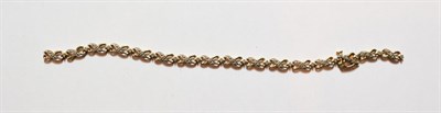Lot 128 - A 9 carat gold diamond bracelet (a.f.), length 19.5cm