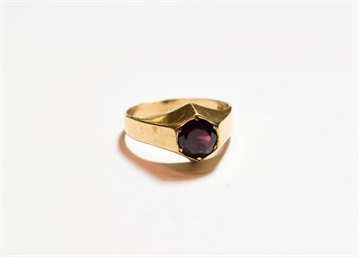 Lot 150 - A 9 carat gold garnet solitaire ring, finger size U