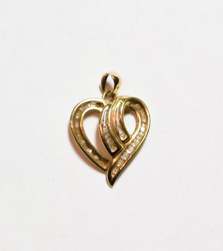 Lot 162 - A diamond set heart shaped pendant, length 2.2cm