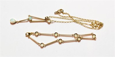 Lot 172 - A 9 carat gold opal necklace, length 41.5cm; and a 9 carat gold opal bracelet, length 18.7cm (2)