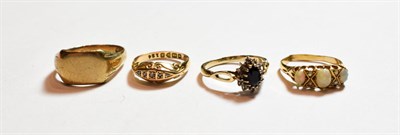 Lot 176 - A 9 carat gold signet ring, misshapen; an 18 carat gold opal and diamond ring, misshapen; an 18...