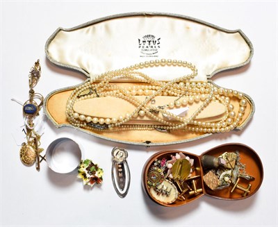 Lot 187 - Two bar brooches, stamped '9CT'; a 9 carat gold locket; a 9 carat gold cross pendant; two brooches