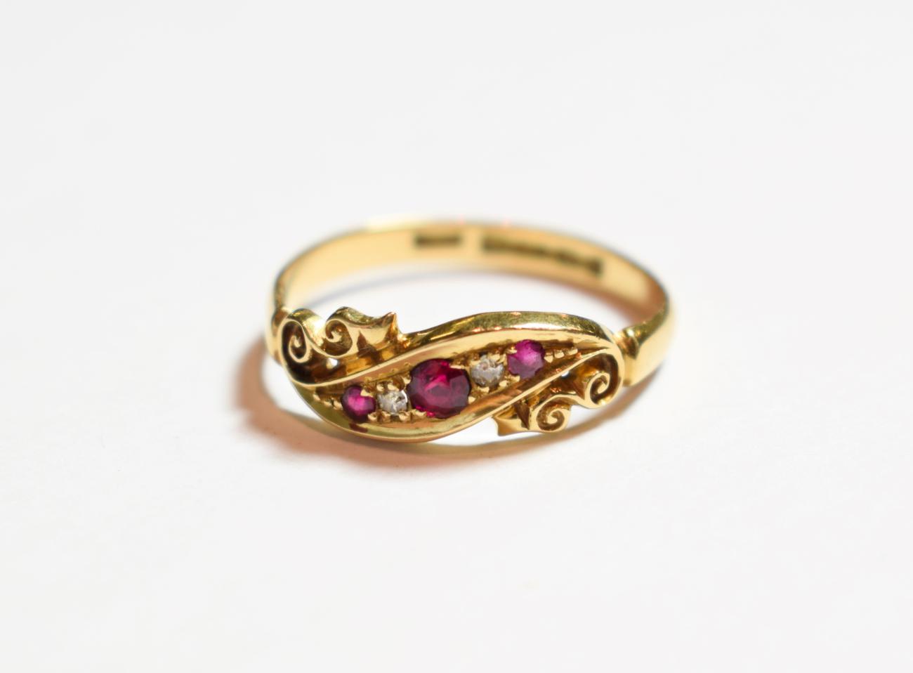Lot 196 - An 18 carat gold ruby and diamond ring, finger size R