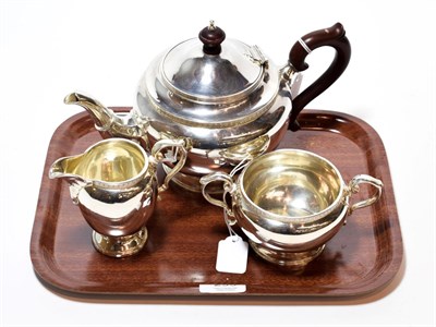 Lot 233 - A three-piece George V silver tea-service, by The Goldsmiths and Silversmiths Co. Ltd., London,...