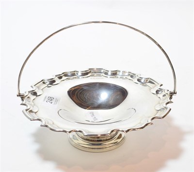 Lot 248 - An Elizabeth II silver basket, by Carr, Sheffield, 2001, shaped circular and on spreading foot,...