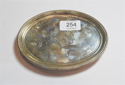 Lot 254 - A George III Scottish silver teapot-stand, maker's mark rubbed, Edinburgh, 1802, oval and with...