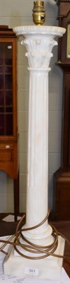 Lot 301 - A tall alabaster table lamp on square base