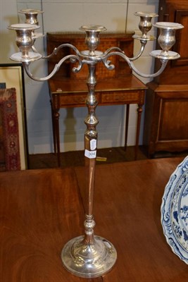 Lot 304 - A large slender decorative five light silver plated candelabra, the four scroll cast arms...