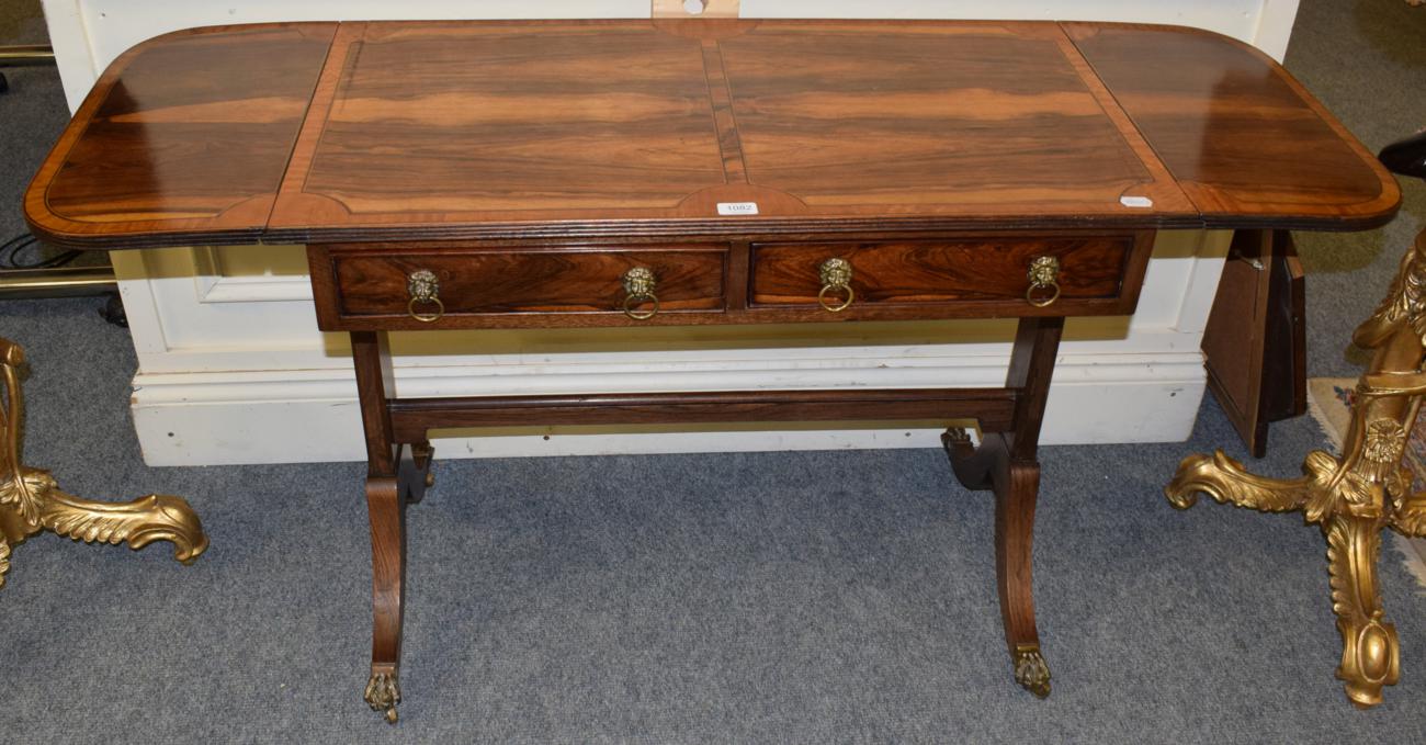 Lot 1082 - A reproduction inlaid and crossbanded simulated rosewood sofa table