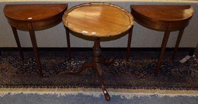 Lot 1087 - A reproduction pie crust topped tripod table; together with a pair of reproduction D end side...