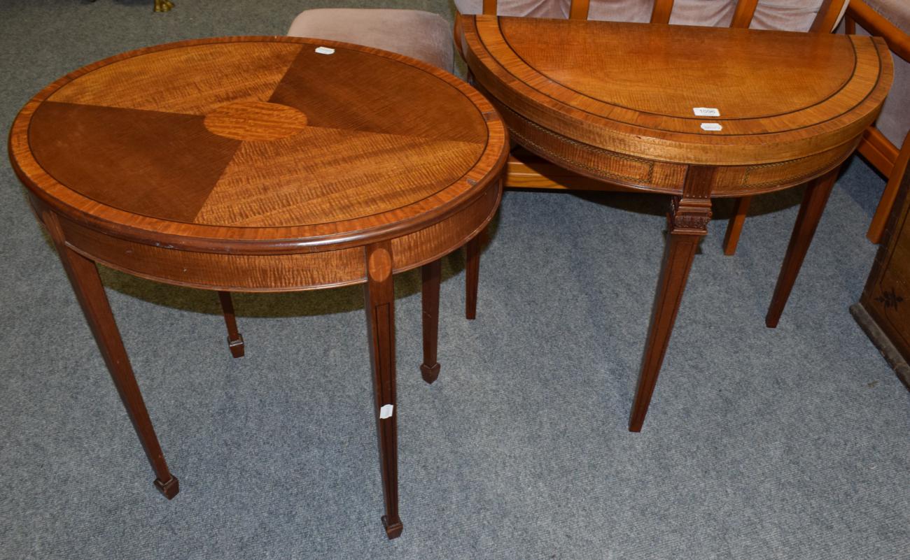 Lot 1096 - A reproduction crossbanded demi-lune side table, together with a similar oval occasional table