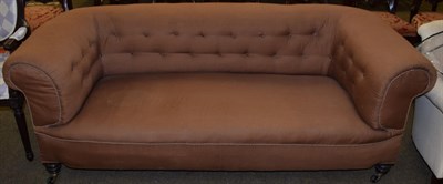 Lot 1120 - A Victorian Chesterfield sofa, the back-right leg engraved J.R.A