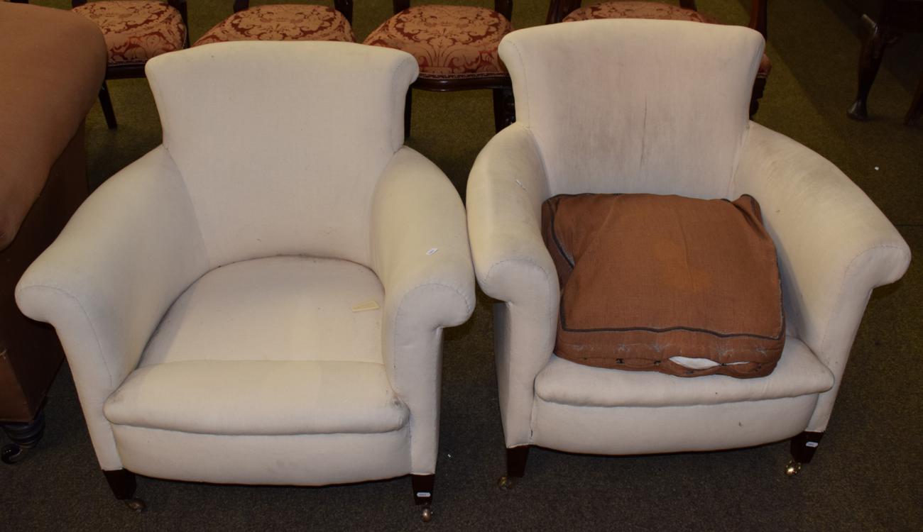 Lot 1121 - A pair of cream upholstered tub chairs